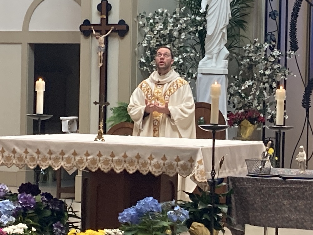 Priest at Altar