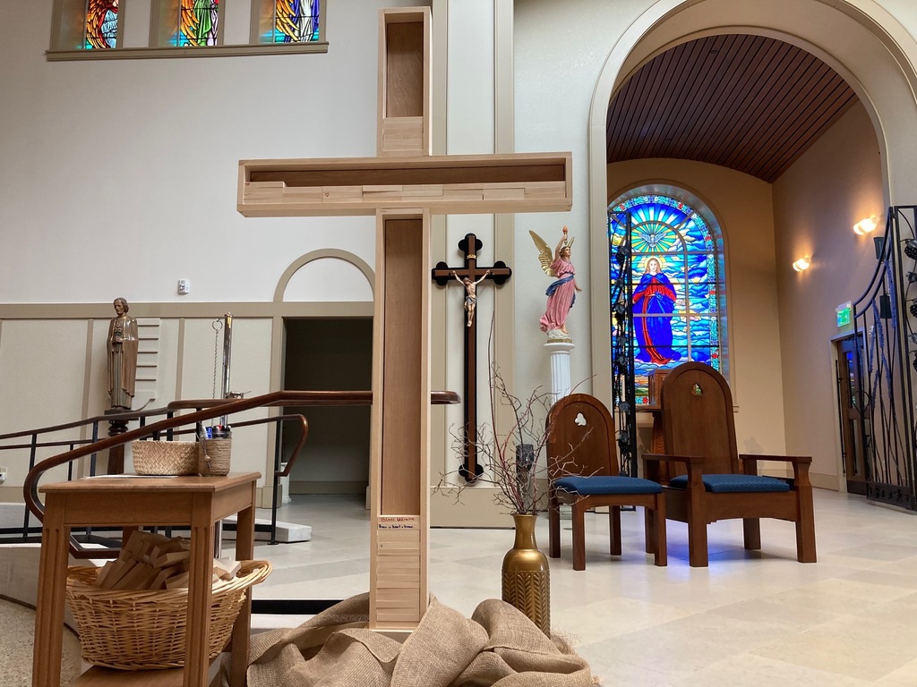 Wooden cross filled with wooden blocks in the chhurch